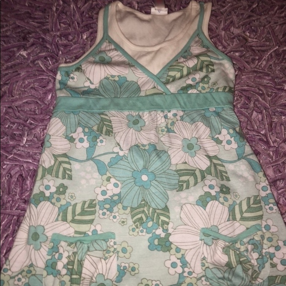 White and green floral sleeveless top